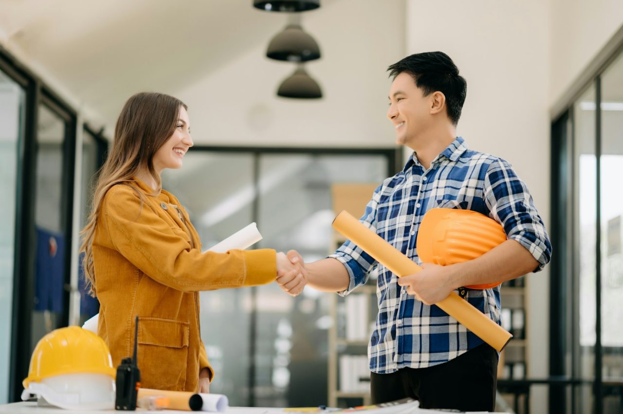 engineers-or-architecture-shaking-hands-at-construction-site.jpg